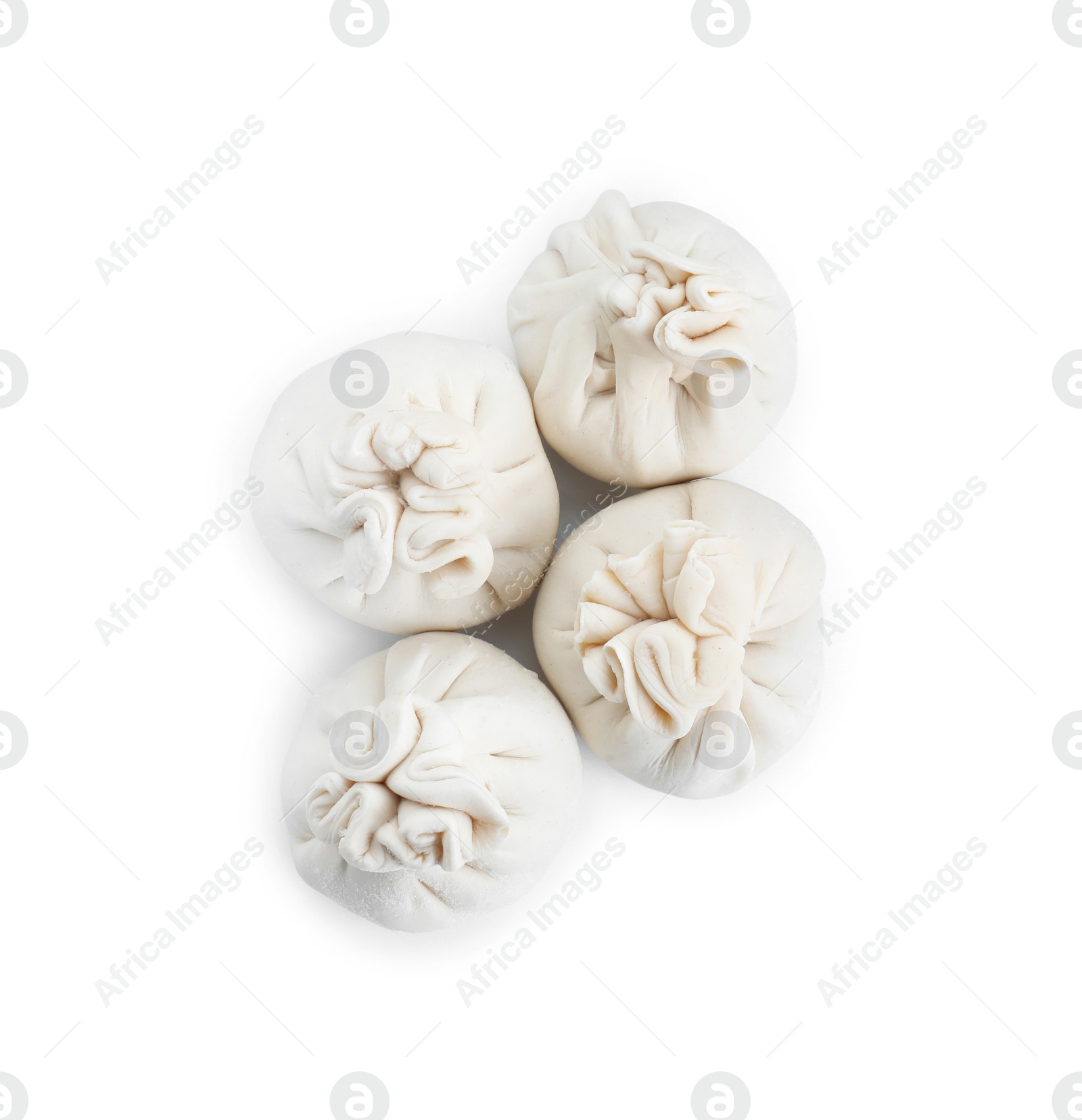 Photo of Uncooked khinkali (dumplings) isolated on white, top view. Georgian cuisine