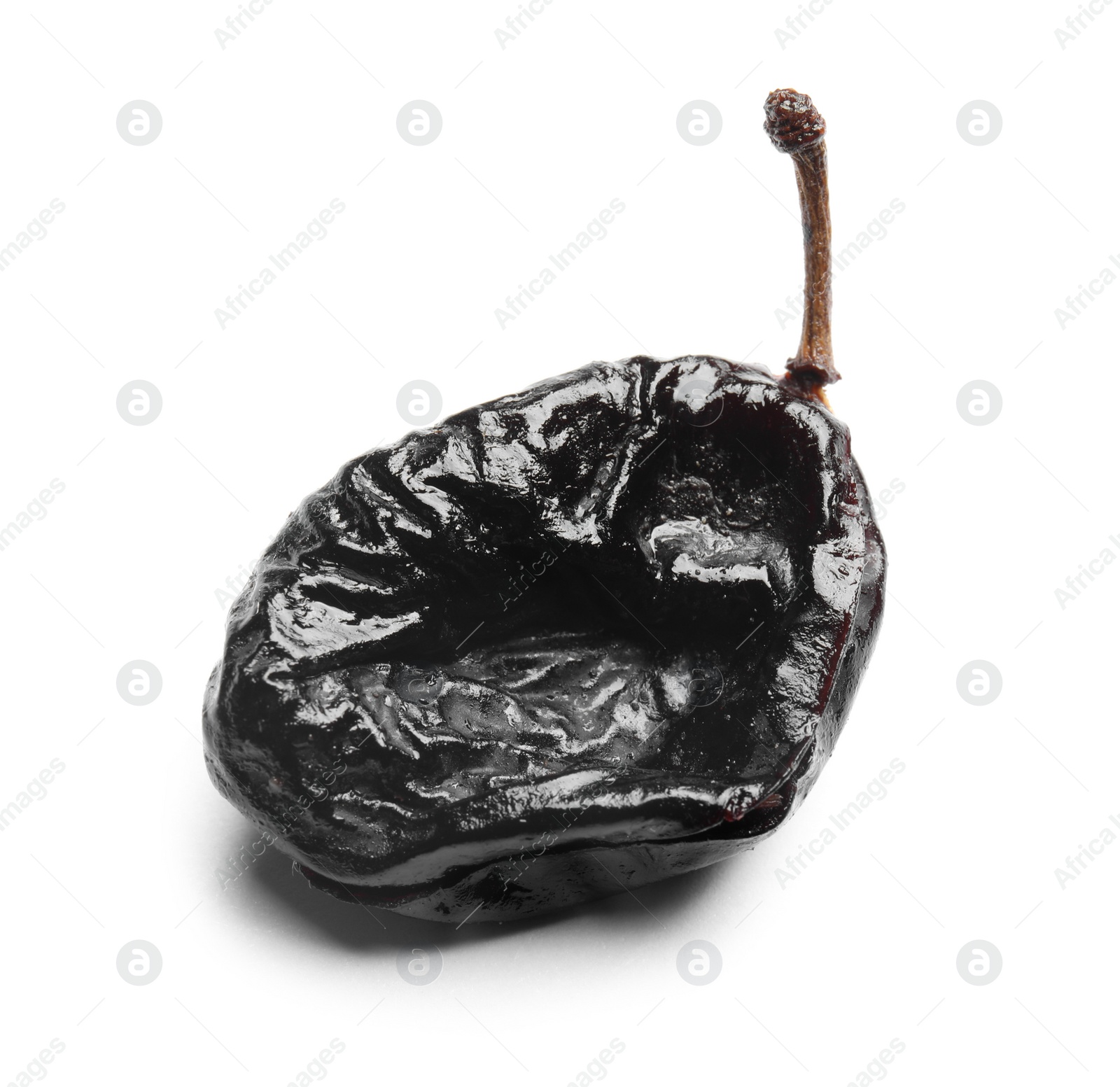 Photo of Tasty prune on white background, closeup. Dried fruit as healthy snack