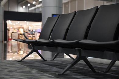Waiting area with seats in airport terminal