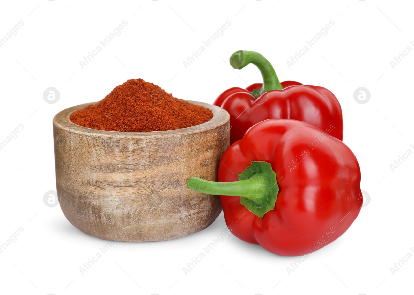 Photo of Bowl with aromatic paprika powder and fresh bell peppers isolated on white