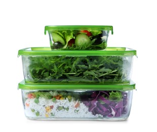 Photo of Glass containers with fresh food on white background