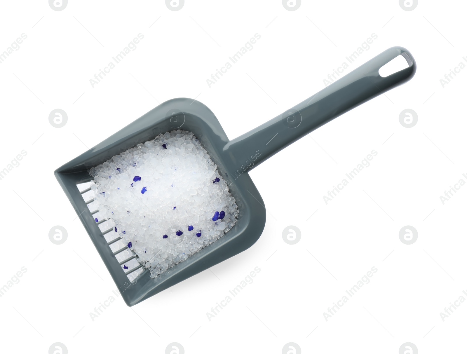 Photo of Grey plastic scoop with cat litter isolated on white, top view