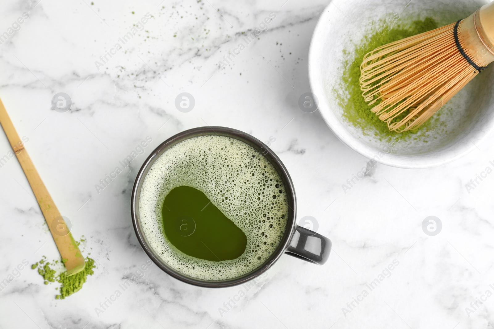 Photo of Flat lay composition with matcha tea on marble background