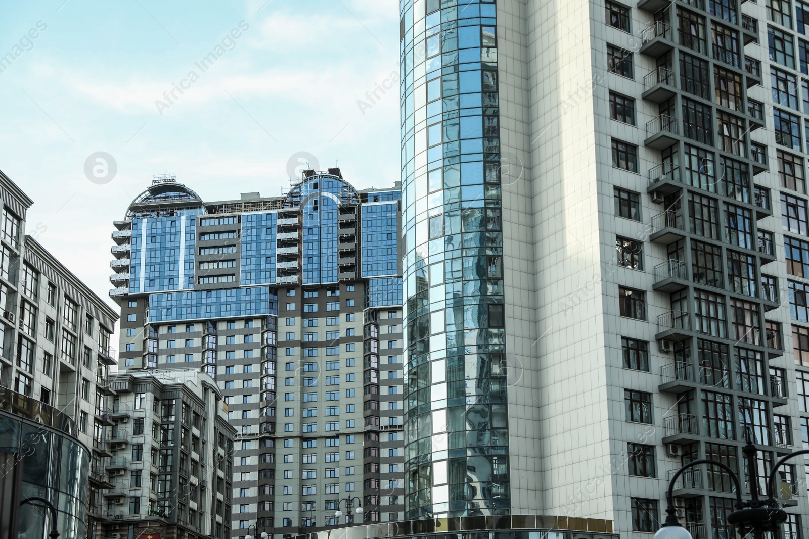 Photo of KYIV, UKRAINE - MAY 21, 2019: Beautiful view of modern housing estate in Pecherskyi district on sunny day