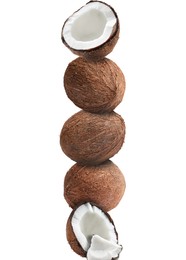 Image of Stack of fresh coconuts on white background