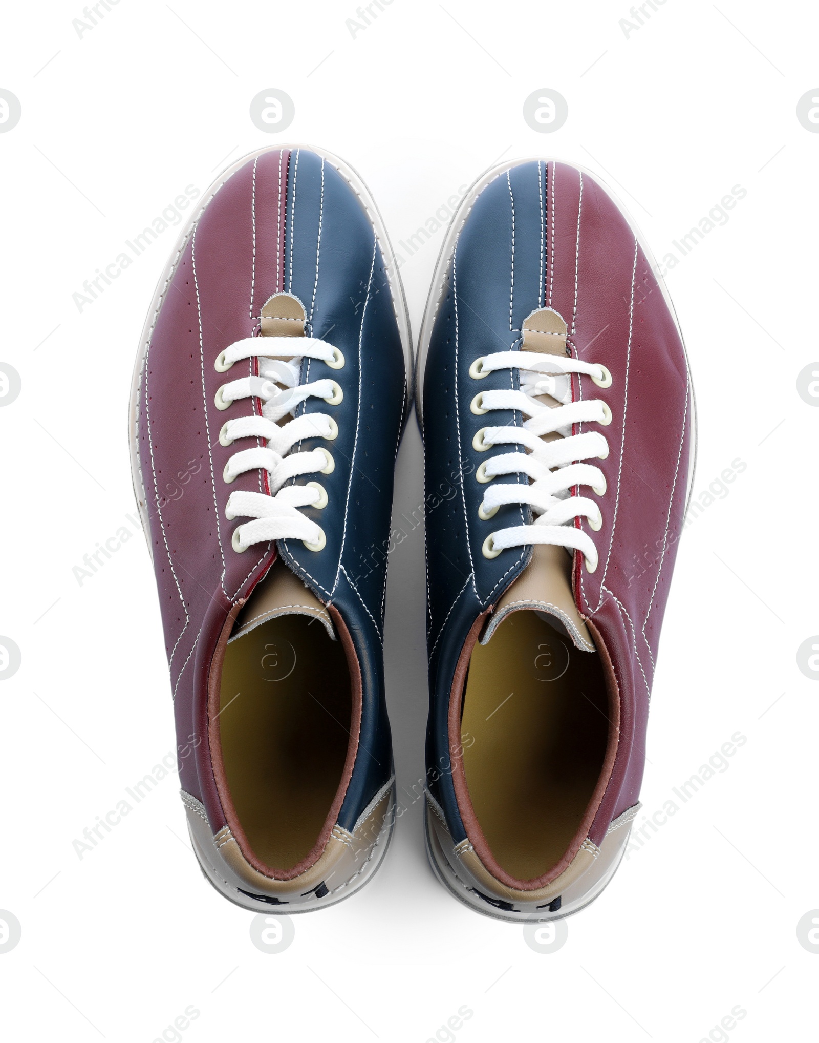 Photo of Pair of bowling shoes isolated on white, top view