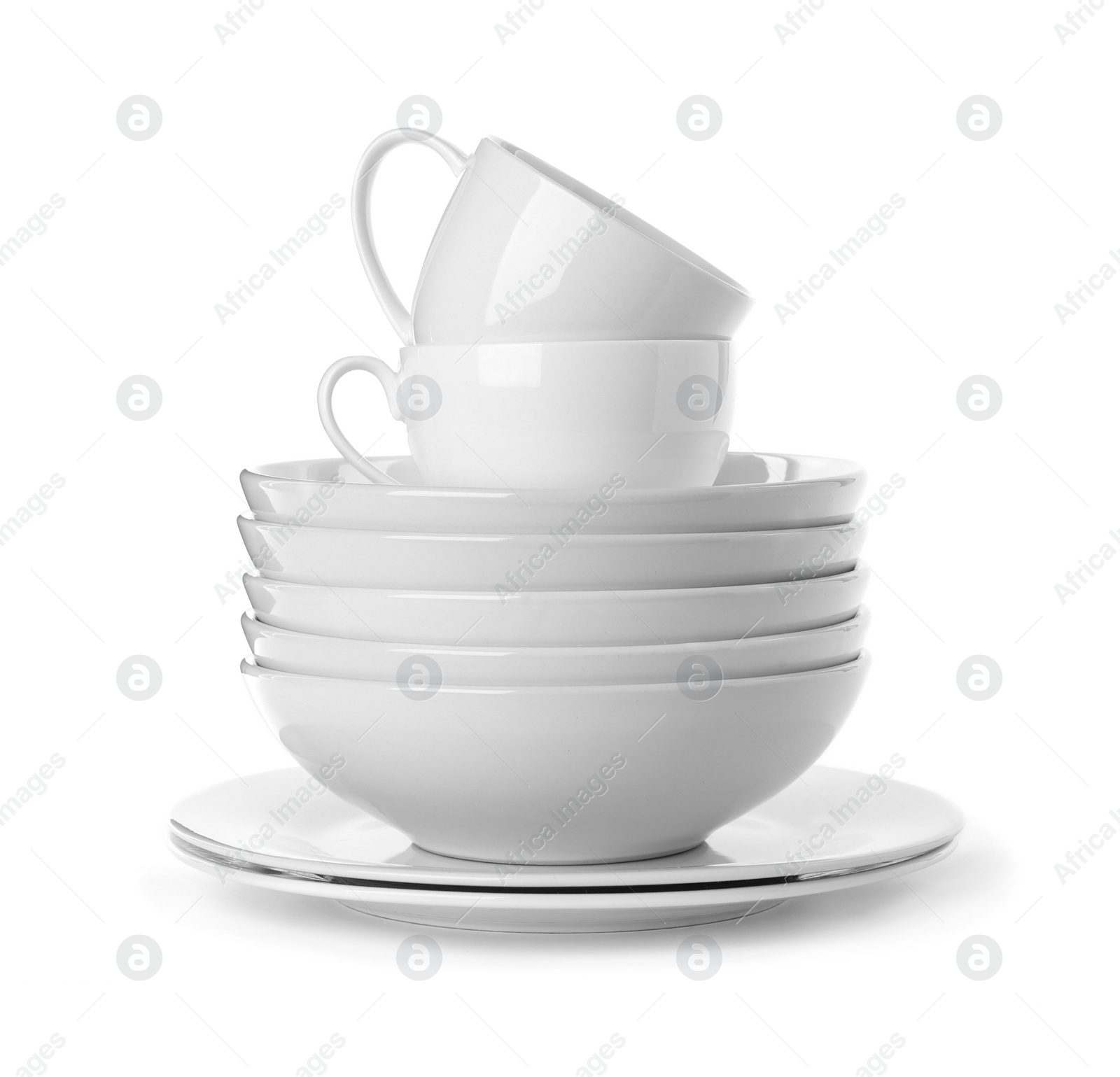 Photo of Set of clean tableware isolated on white