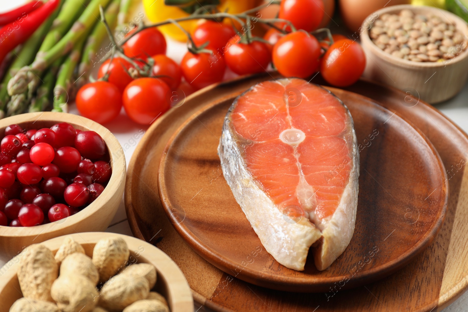 Photo of Many different healthy food on white table, closeup