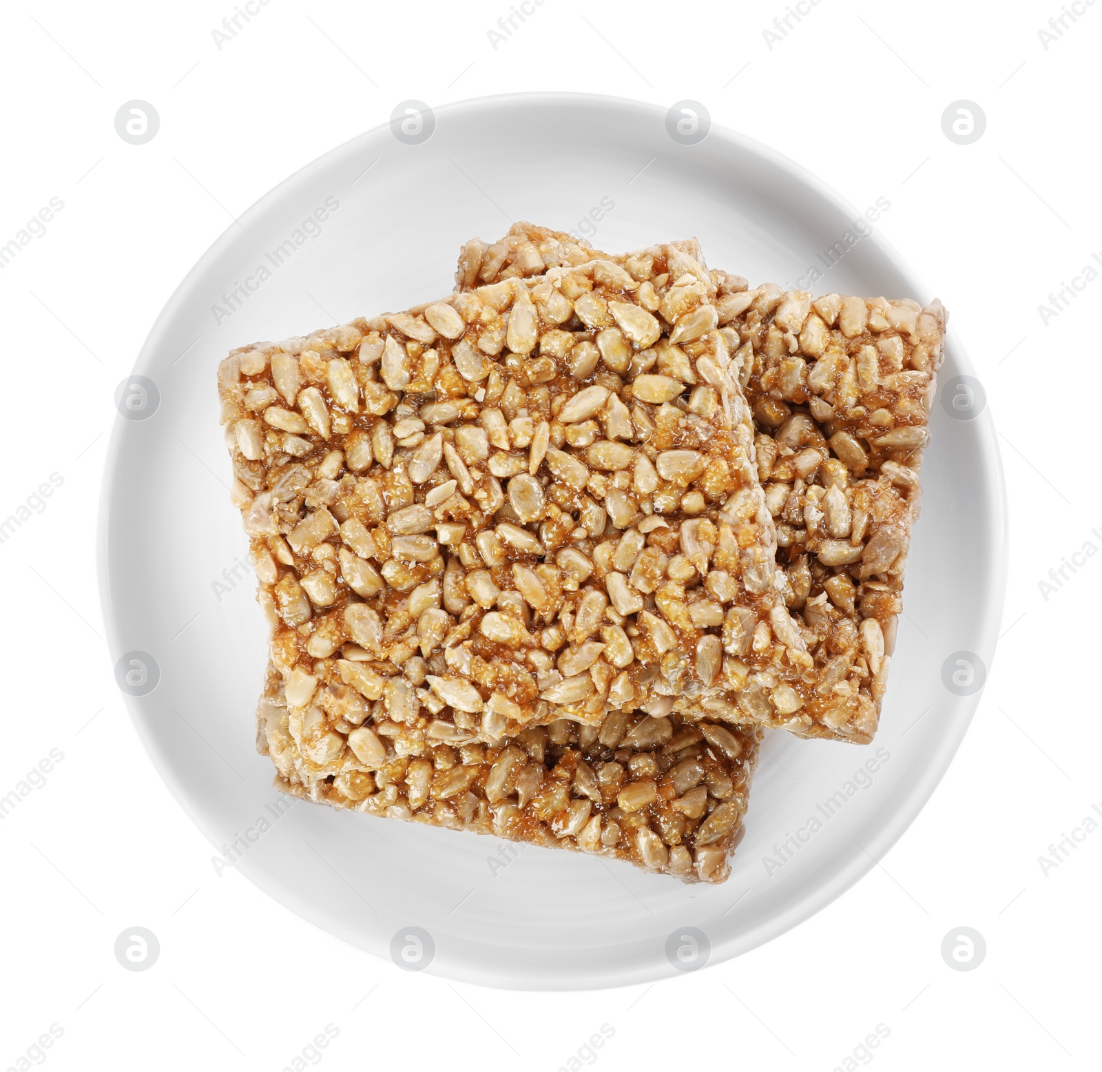 Photo of Delicious sweet kozinaki bars on white background, top view