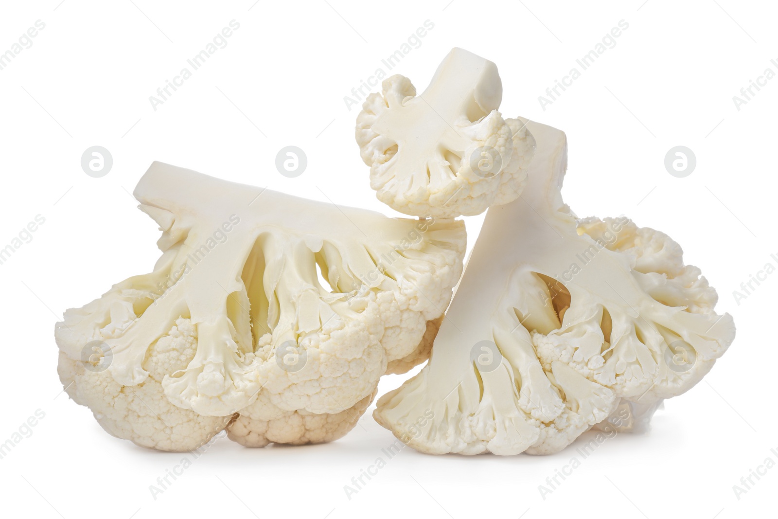 Photo of Cut fresh raw cauliflowers on white background