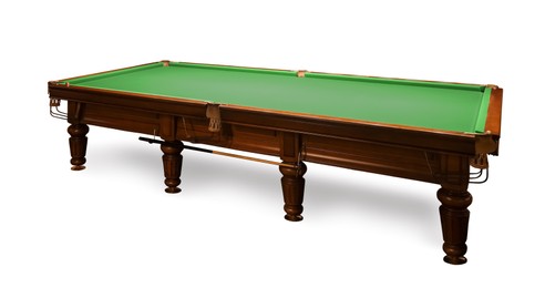 Billiard table with wooden cue on white background