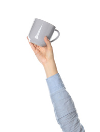 Woman holding cup on white background, closeup