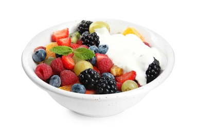 Photo of Fresh tasty fruit salad with yogurt on white background