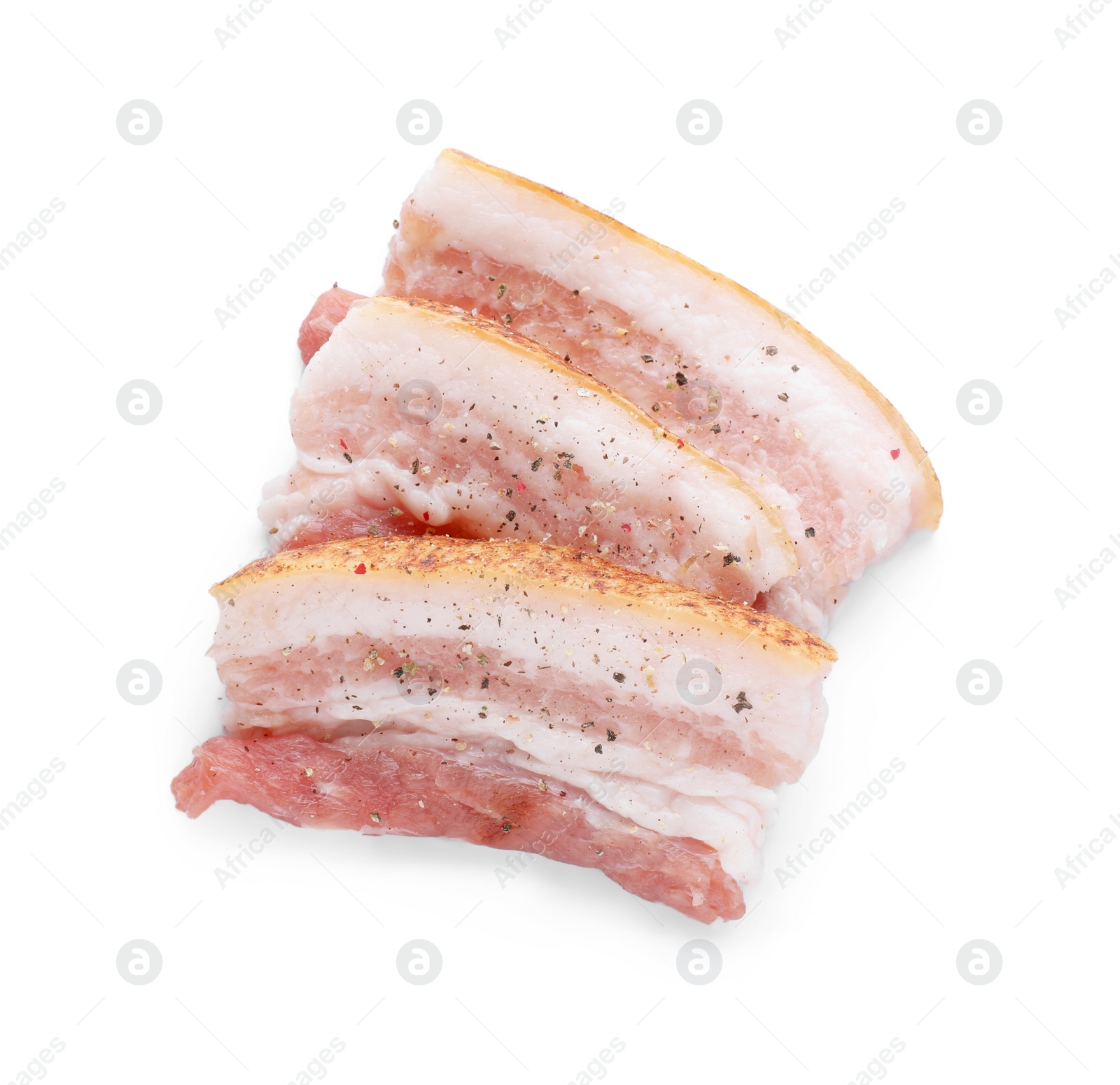 Photo of Slices of tasty pork fatback with spices isolated on white, top view