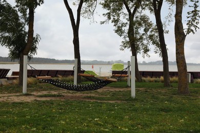 Photo of Recreation area with hammock for rent outdoors. Real estate