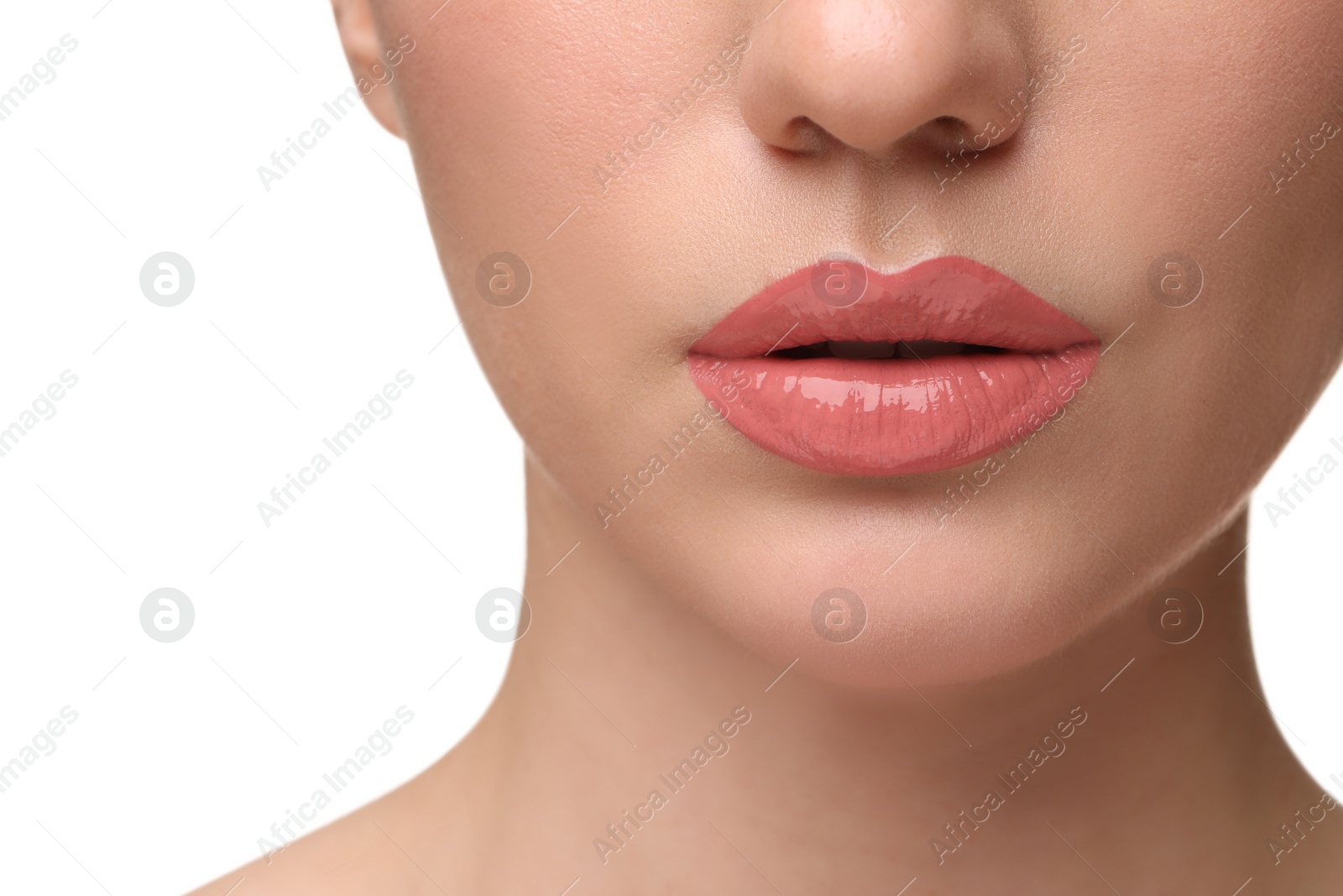 Photo of Woman wearing beautiful lip gloss on white background, closeup