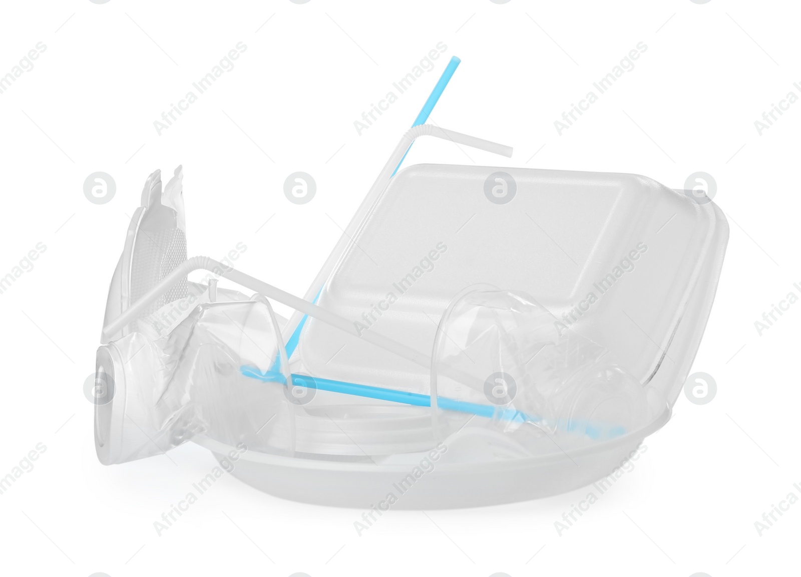 Photo of Pile of different plastic items on white background