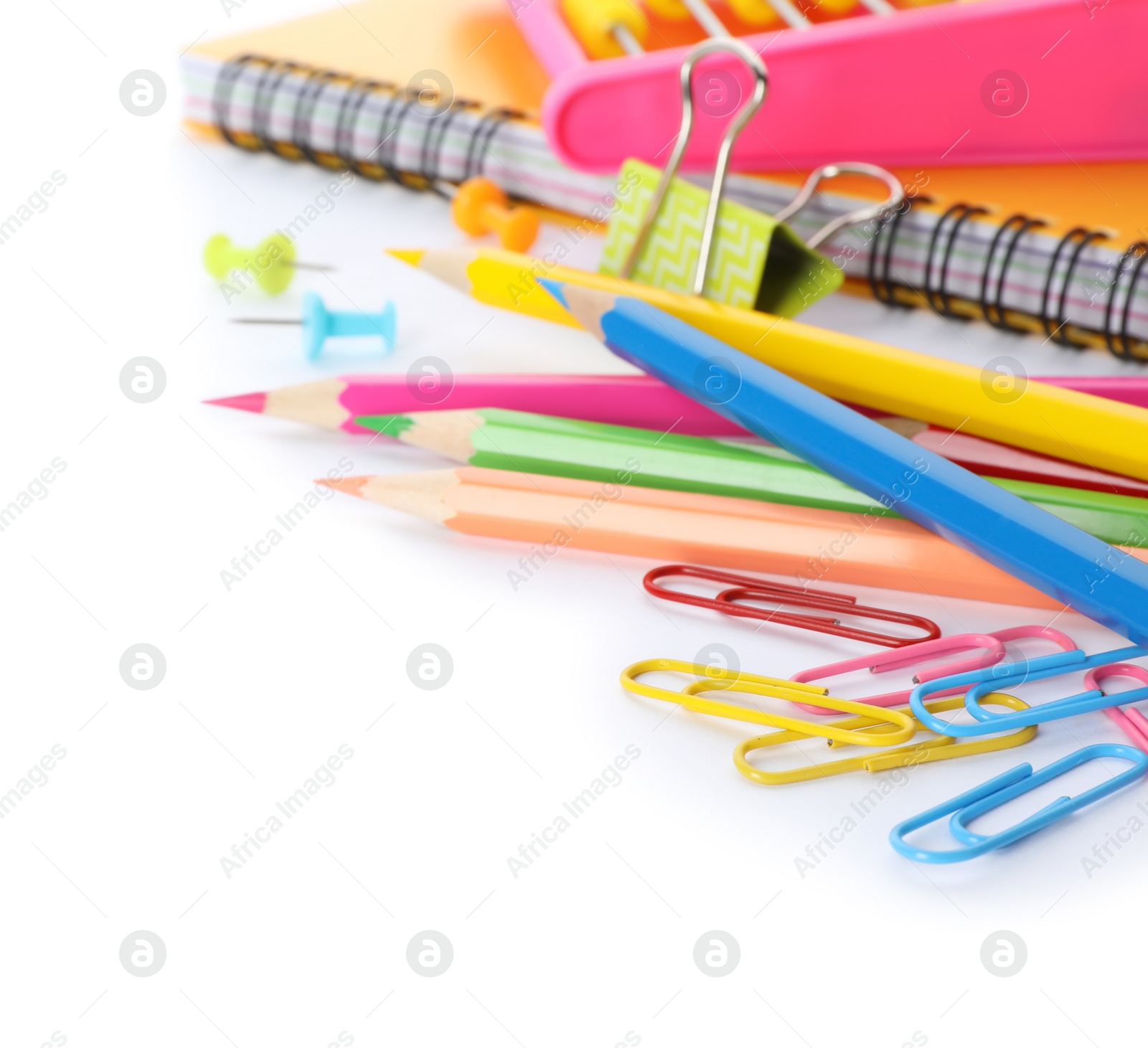 Photo of Different colorful stationery on white background. Back to school