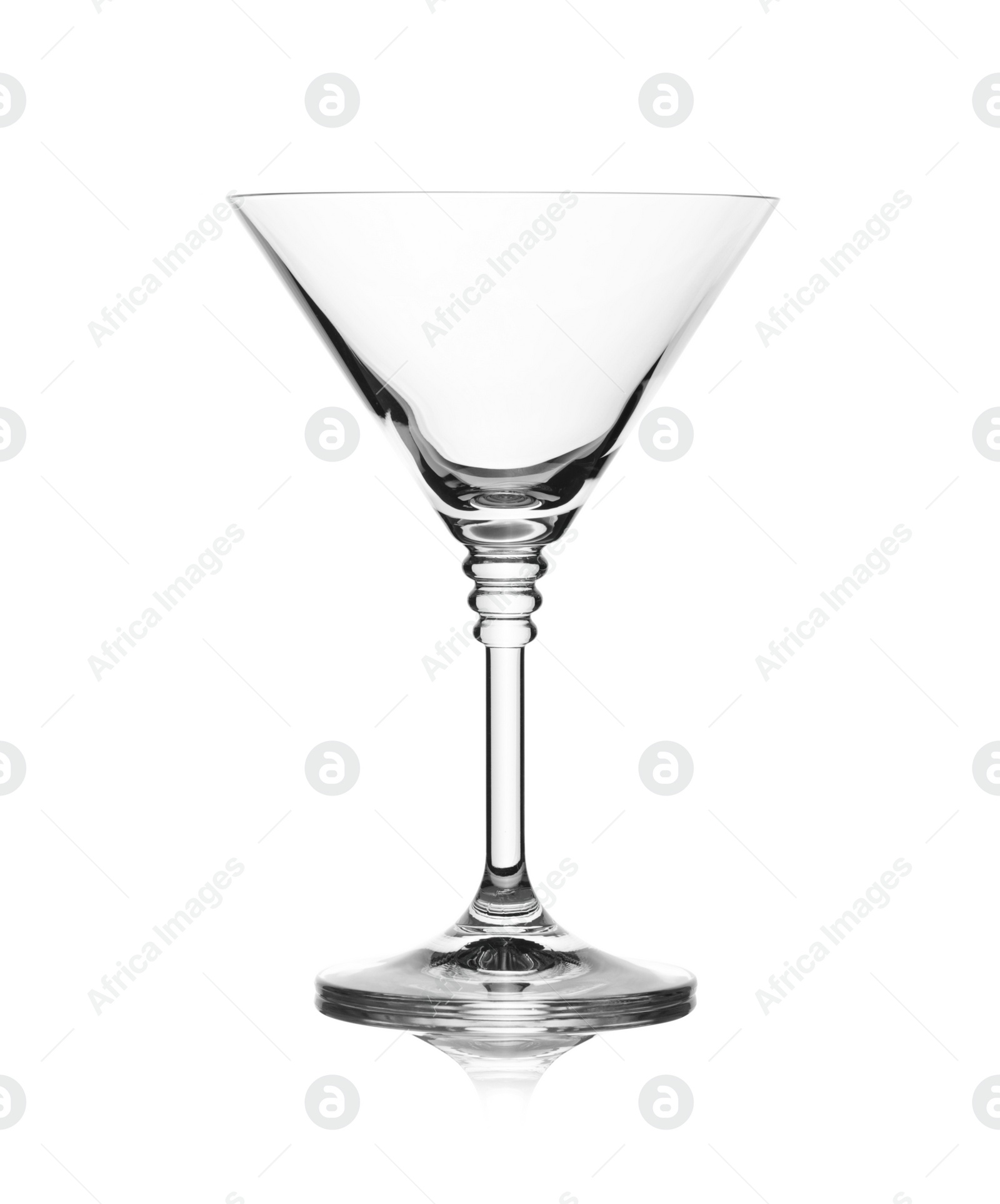 Photo of Empty crystal martini glass on white background