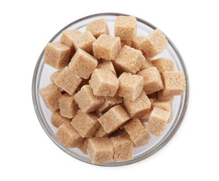 Photo of Glass bowl of brown sugar cubes isolated on white, top view