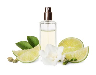 Photo of Bottle of perfume, lime, flower and cardamom on white background