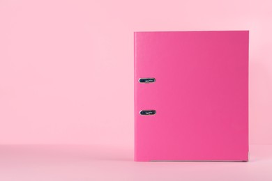 Photo of Office folder on pink background, space for text