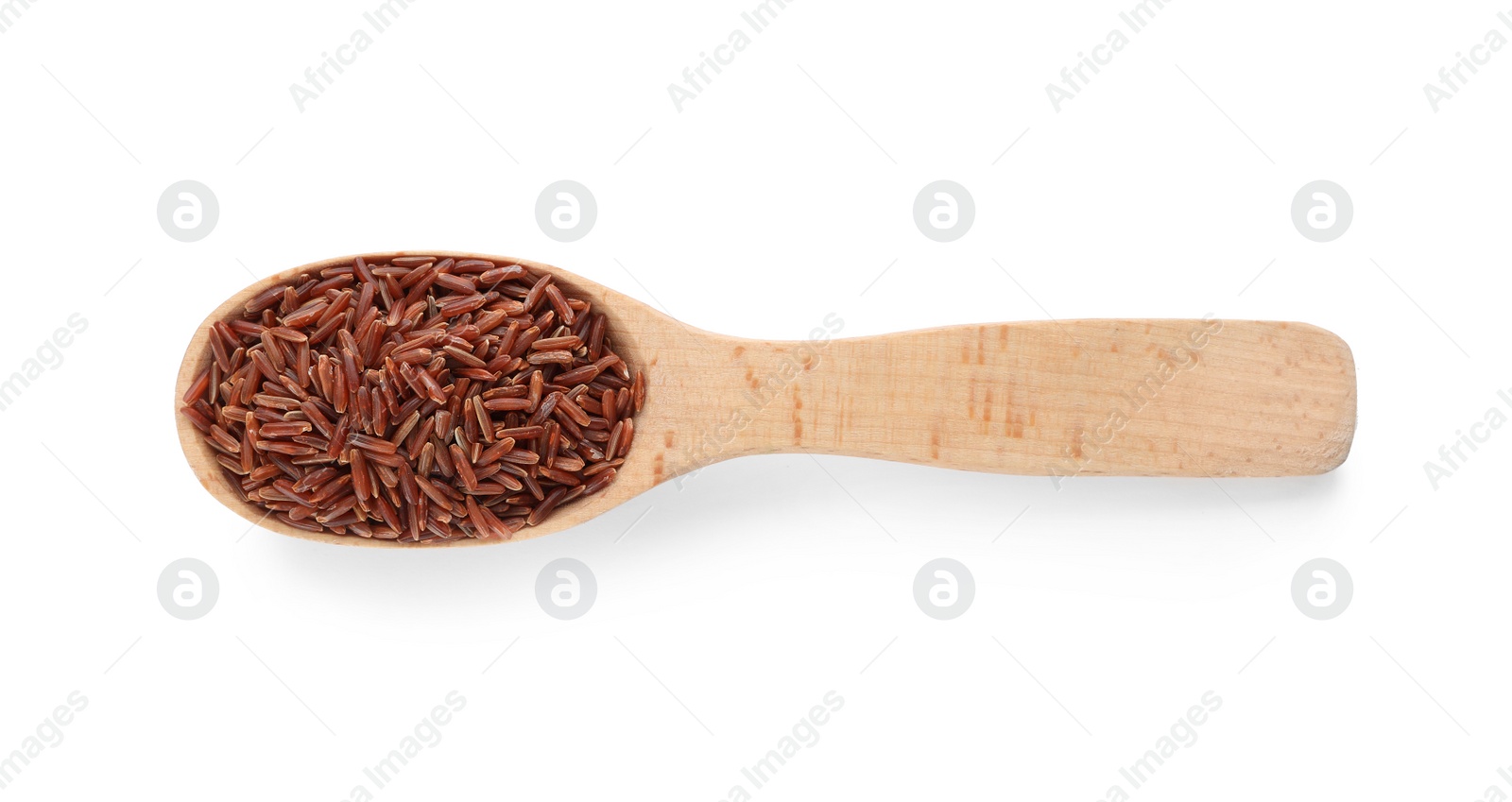 Photo of Wooden spoon with brown rice on white background, top view