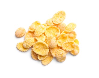 Photo of Heap of tasty crispy corn flakes isolated on white, top view