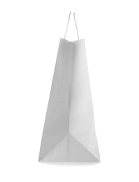 Photo of Empty paper shopping bag on white background