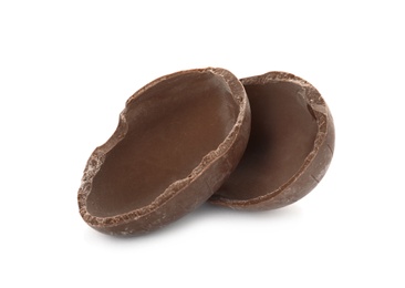 Photo of Broken milk chocolate egg on white background