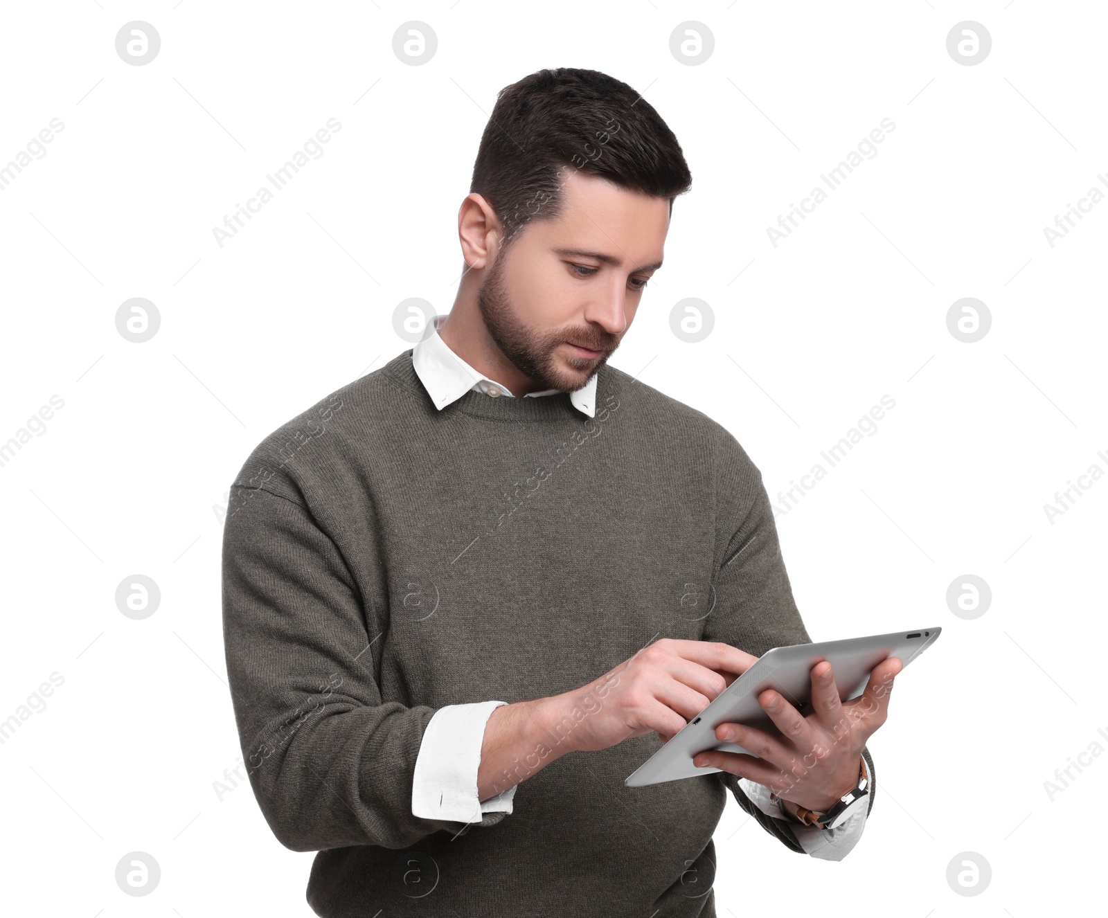 Photo of Handsome bearded businessman using tablet on white background