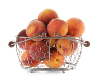 Photo of Metal basket with fresh sweet peaches on white background