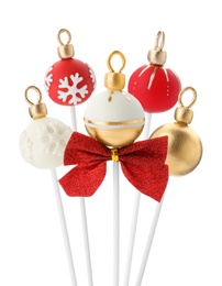 Image of Set of Christmas themed cake pops on white background