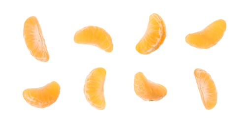 Image of Set with pieces of fresh ripe tangerine on white background