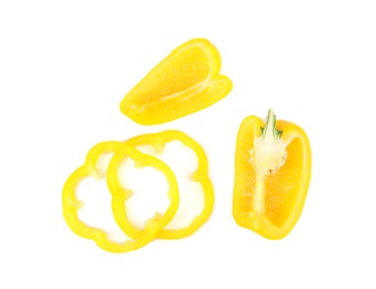 Cut yellow bell peppers isolated on white, top view