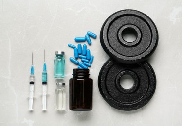 Different drugs and sports equipment on grey background, flat lay. Doping control