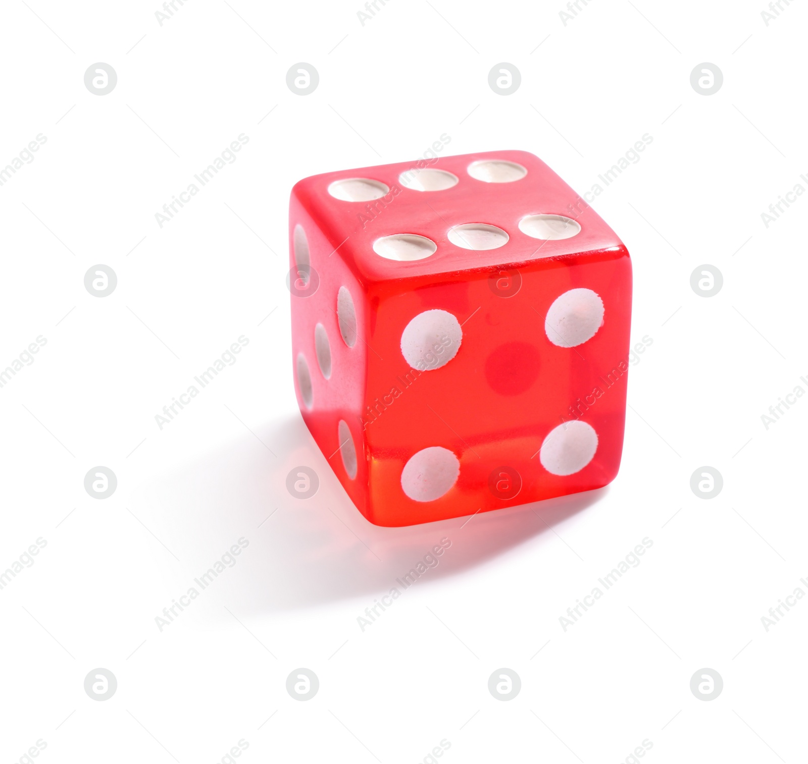 Photo of One red game dice isolated on white