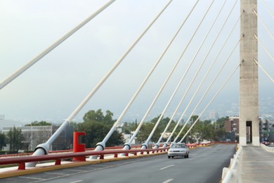 Photo of Beautiful view of modern bridge with asphalt road
