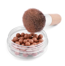 Photo of Face powder balls and brush isolated on white
