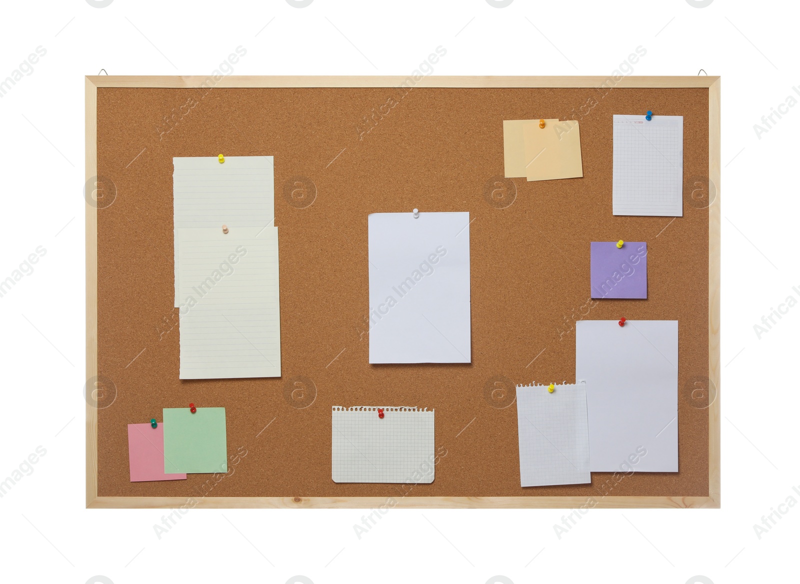 Photo of Empty notes pinned to cork board on white background