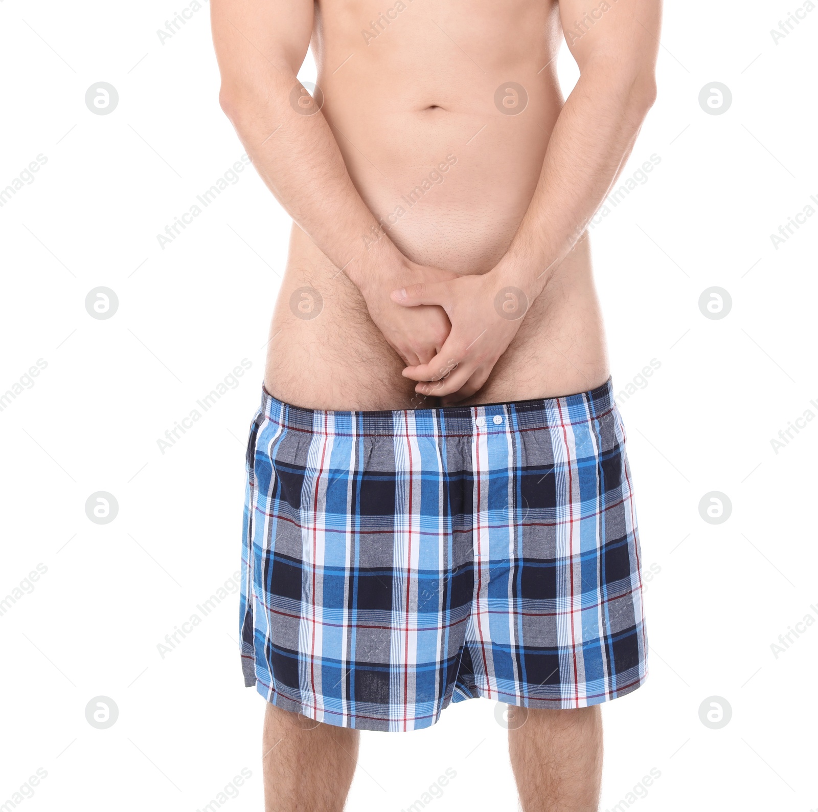 Photo of Young man with urological problems on white background