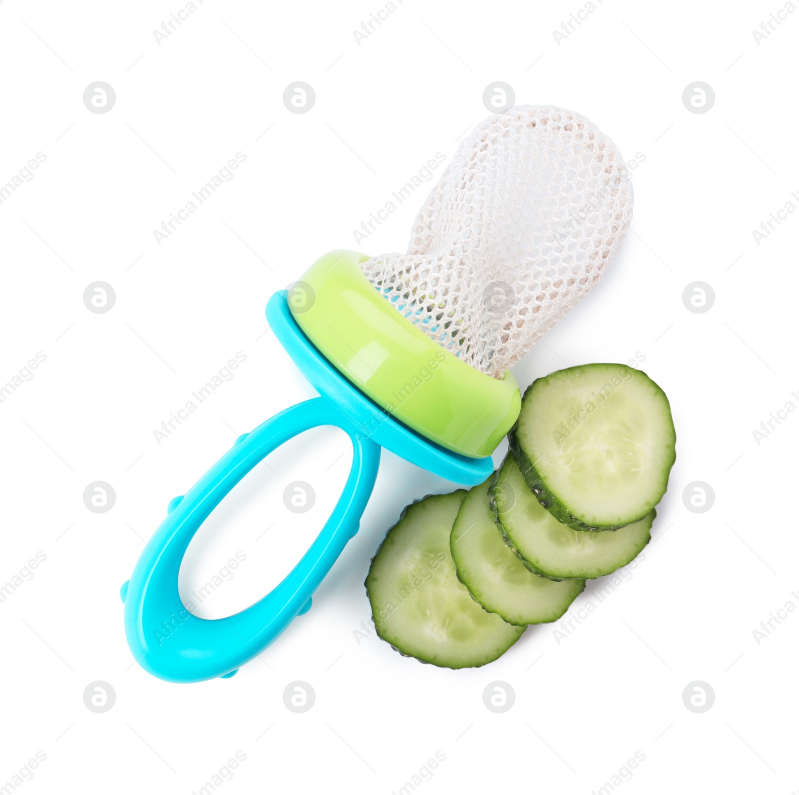 Photo of Empty nibbler and cut cucumber on white background, top view. Baby feeder