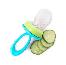Empty nibbler and cut cucumber on white background, top view. Baby feeder