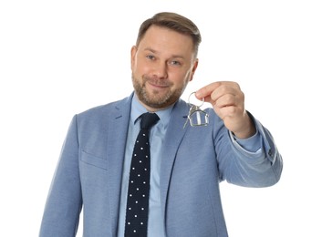 Photo of Real estate agent holding key on white background