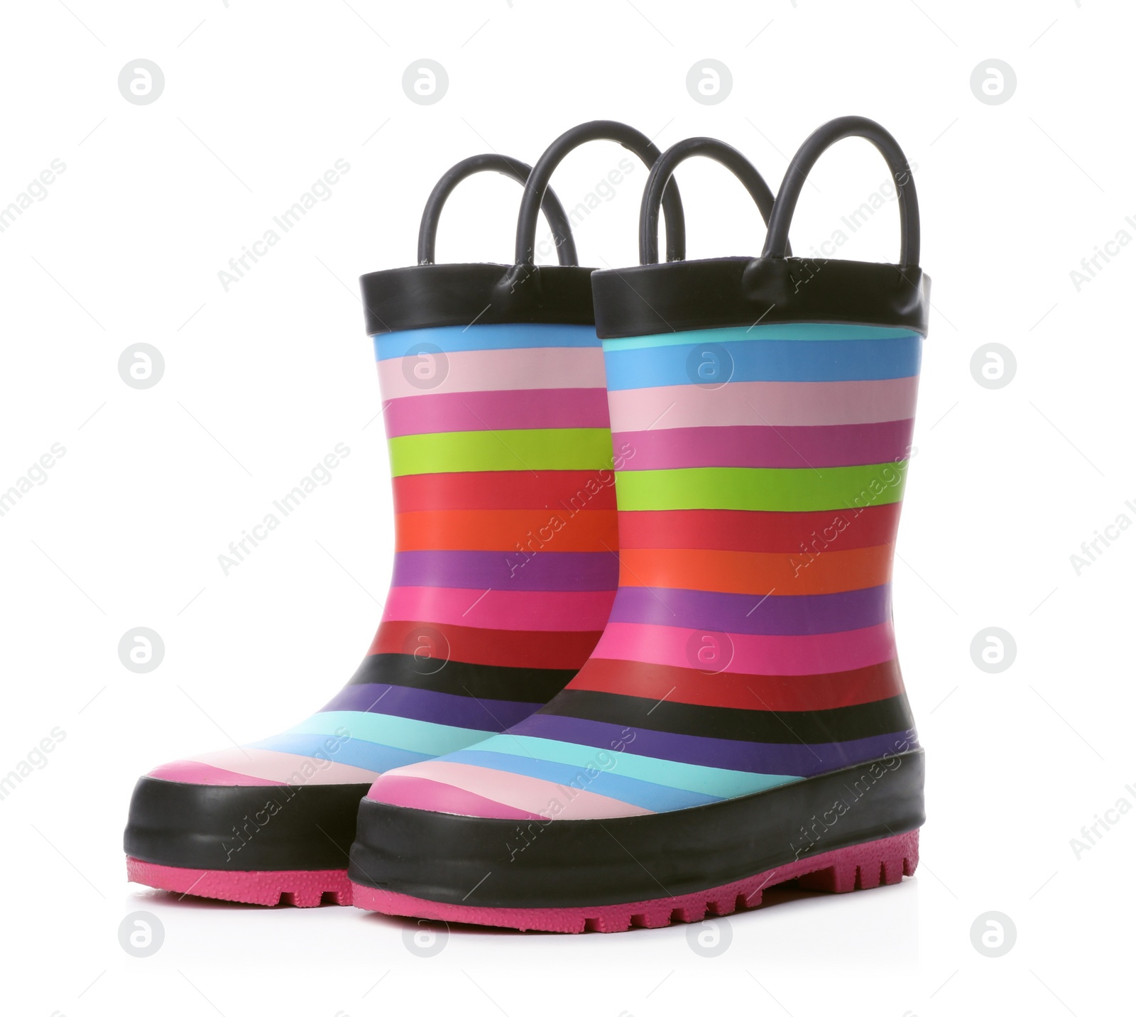 Photo of Colorful children's rubber boots on white background