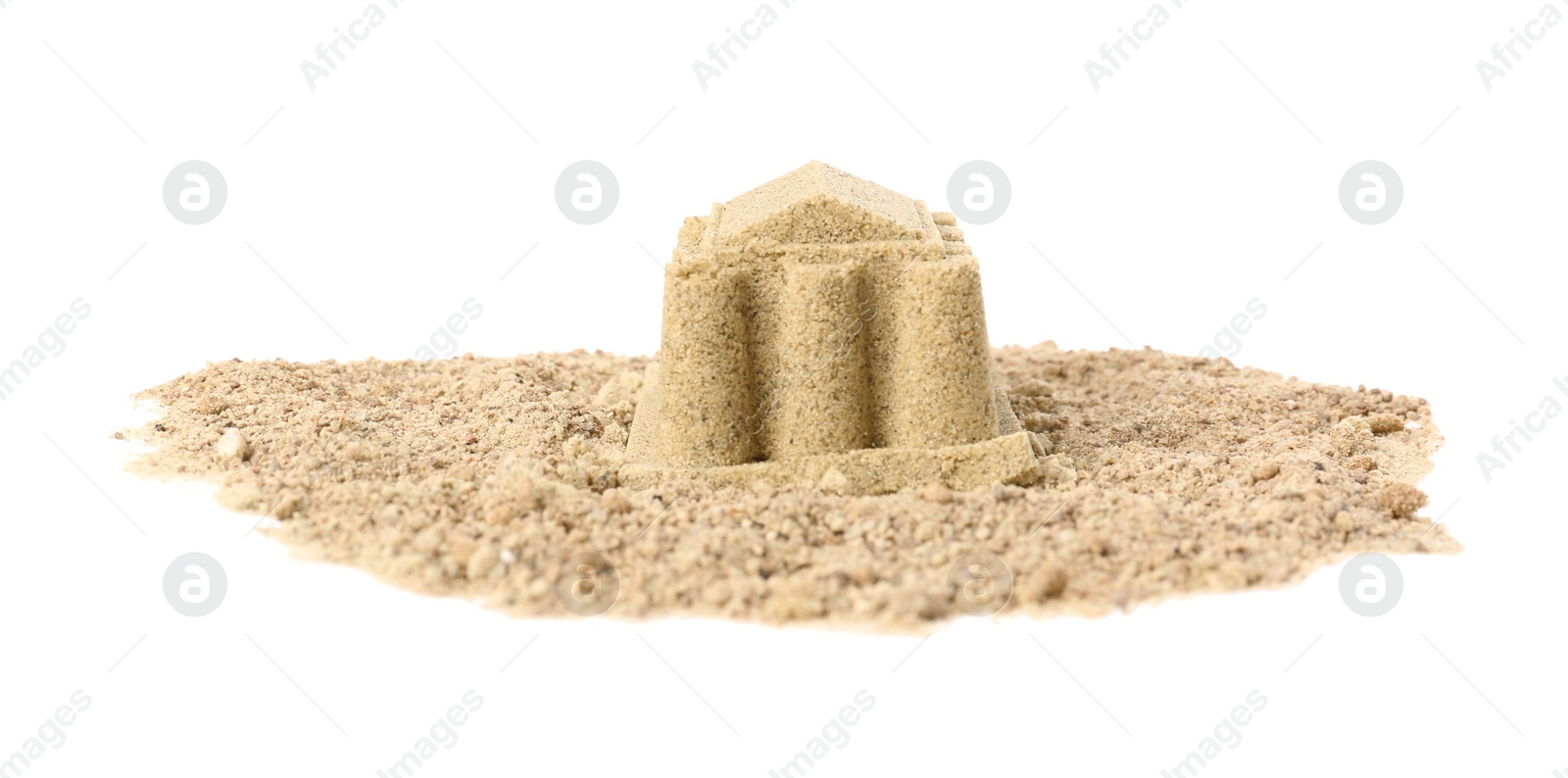 Photo of Pile of sand with beautiful castle isolated on white. Outdoor play