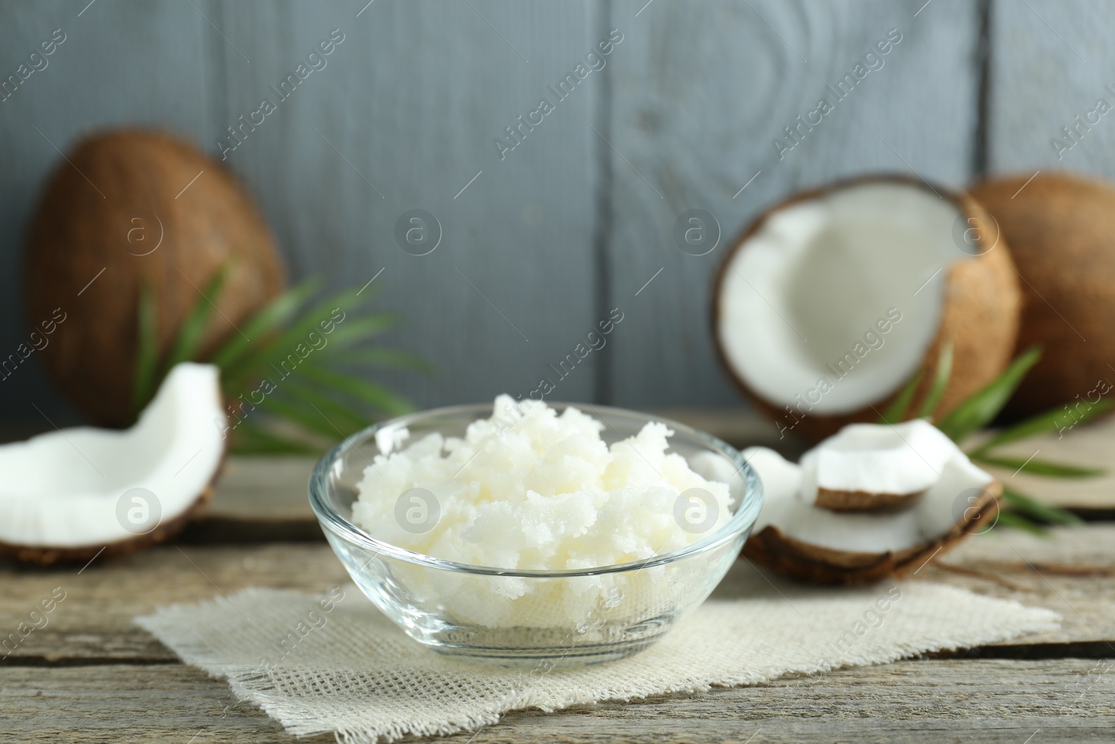 Photo of Organic coconut cooking oil on wooden table