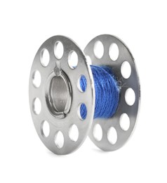 Photo of Metal spool of blue sewing thread isolated on white