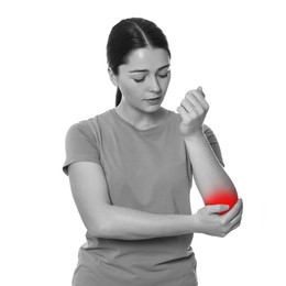 Woman suffering from rheumatism on white background. Black and white effect with red accent in painful area