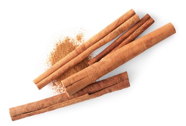Dry aromatic cinnamon sticks and powder isolated on white, top view